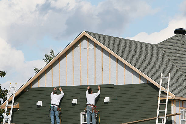 Professional Siding Repair technician working in Wellesley, MA